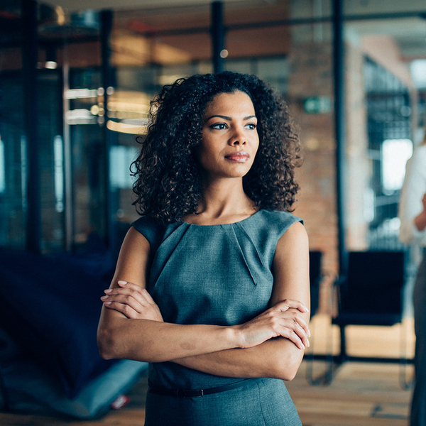 image-woman-and-teamwork-behind-940287820.jpg