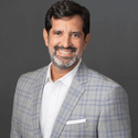 Portrait of Marc Baca, leadership advisor at Russell Reynolds Associates