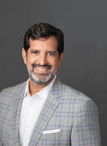 Portrait of Marc Baca, leadership advisor at Russell Reynolds Associates