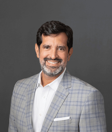 Portrait of Marc Baca, leadership advisor at Russell Reynolds Associates