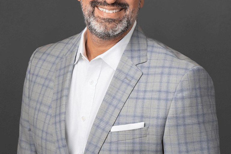 Portrait of Marc Baca, leadership advisor at Russell Reynolds Associates
